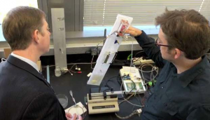 Dr Sam Browd and Professor Barry Lutz in the bioengineering lab